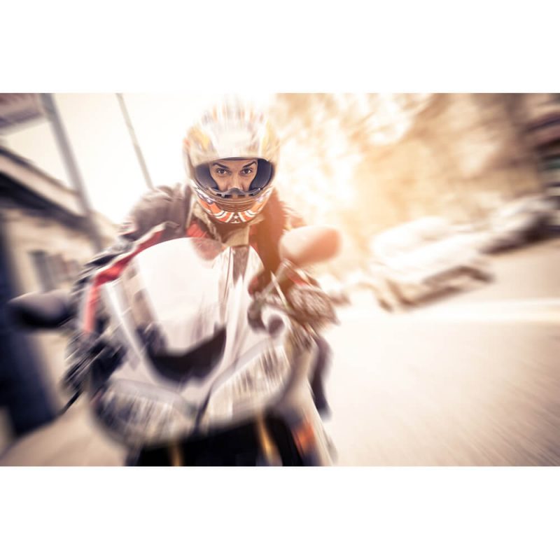 SG2193 man riding motor bike biker speeding streets