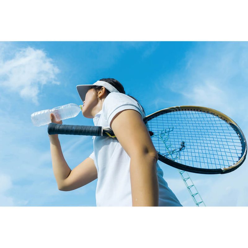 SG2235 female tennis player drinking water