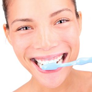 SG2333 brushing teeth woman