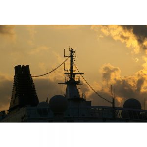 SG2450 ocean ship faces sunset