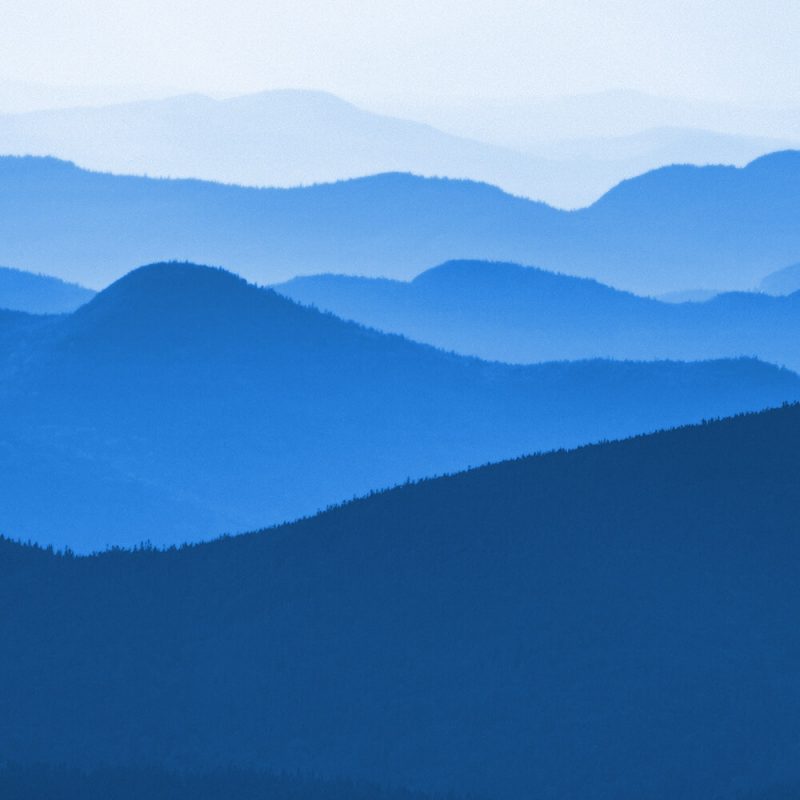 TM2827 hills distance landscape bricght blue
