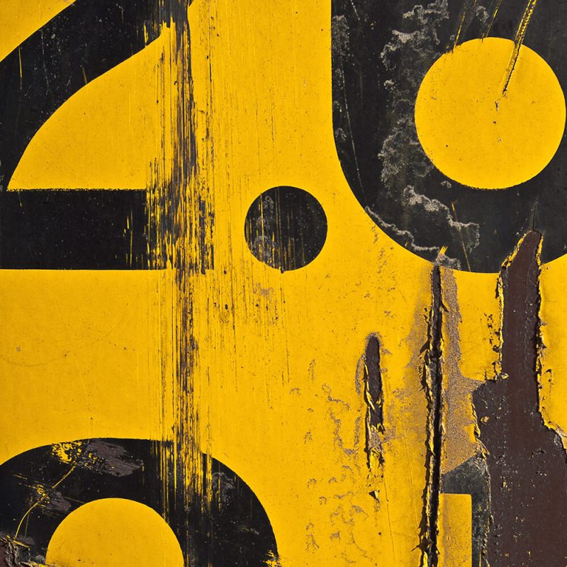 TM2971 numbers yellow distressed background