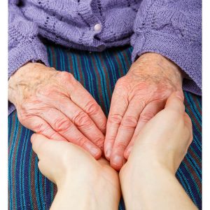 SG2799 carer helping hands elderly woman